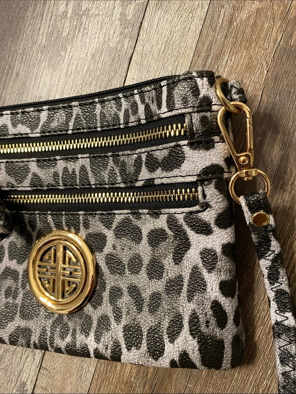 Leopard Print Wristlet Clutch with Gold Emblem